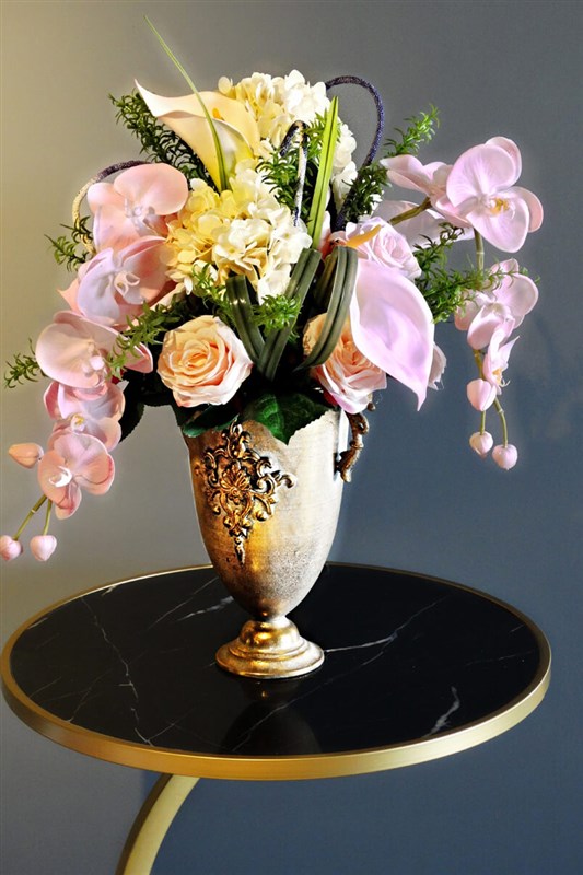 Arrangement of Orchids, Roses and Ortans in a Decorative Ceramic Vase